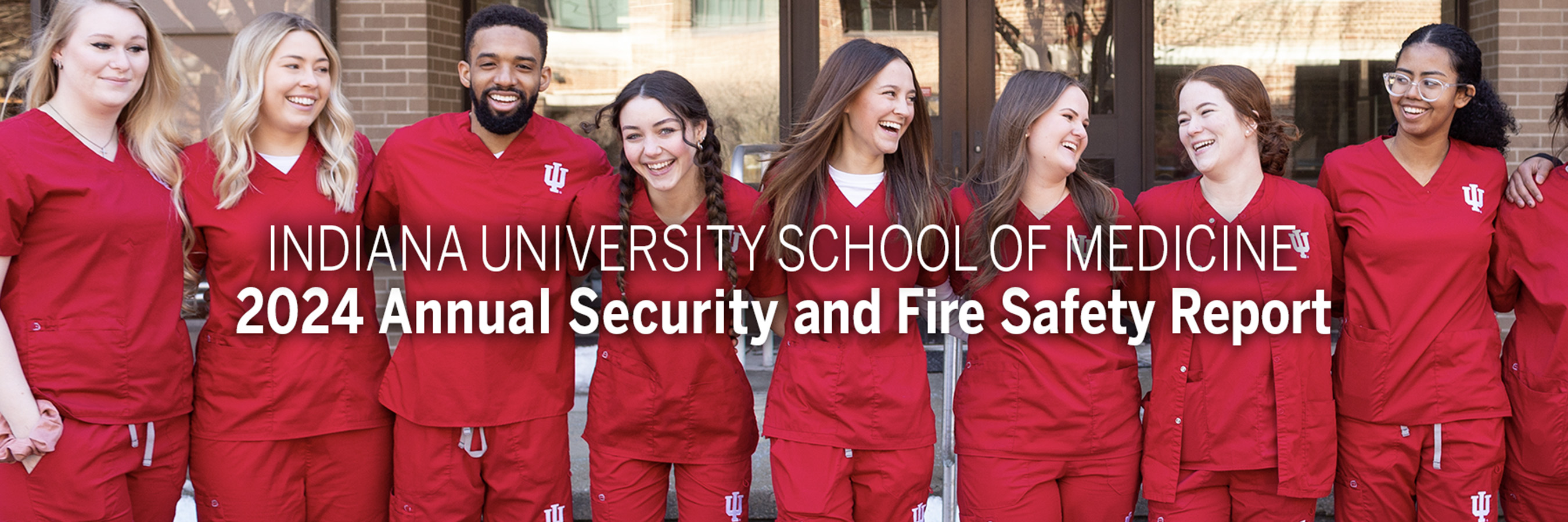 Indiana University School of Medicine 2024 Annual Security and Fire Safety Report The background depicts a group of male and female nurses wearing red scrubs and smiling with arms on each other's shoulders.