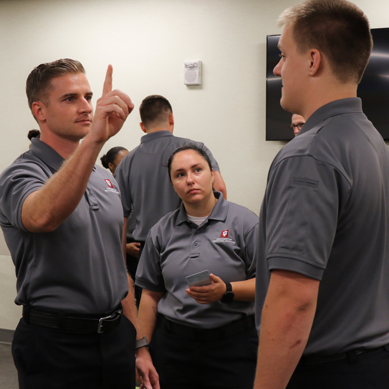 An IUPA cadet conducts an eye tracking test on a classmate as part of DUI training. The eye tracking test is formally called Horizontal Gaze Nystagmus (HGN), and is performed by waving a finger, pen, or other object to the right or left while assessing the other person's ability to follow the line with their eyes only. 